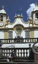 A woman relaxing outside the Igreja Matriz de Santo Antonio in T Royalty Free Stock Photo